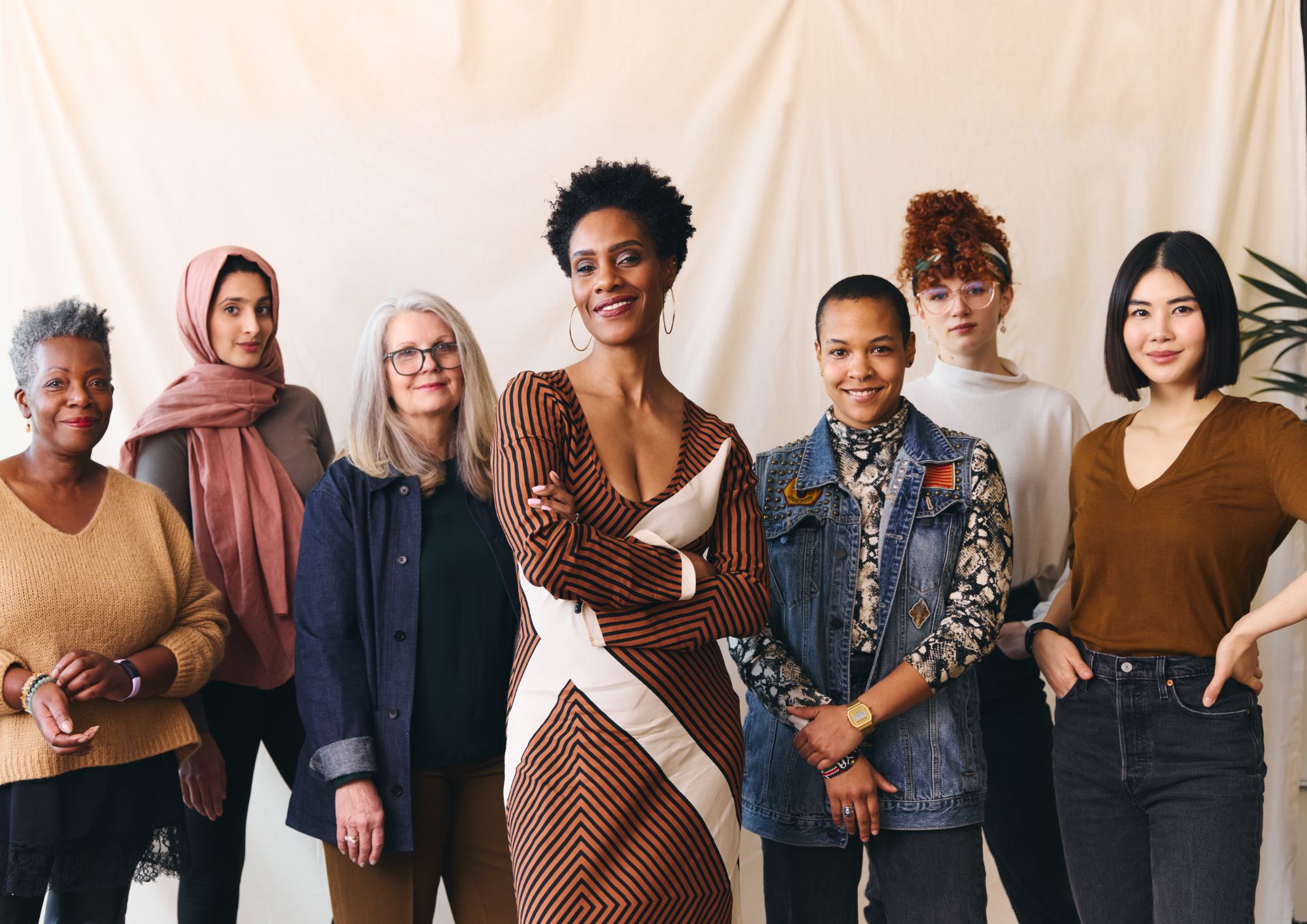 A diverse group of women founders standing together
